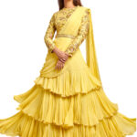 yellow embroidered ruffle drape saree